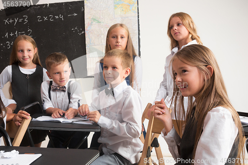 Image of School children in classroom at lesson