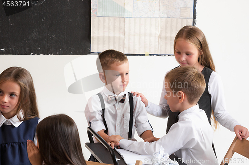 Image of School children in classroom at lesson