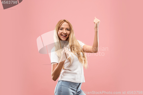 Image of Winning success woman happy ecstatic celebrating being a winner. Dynamic energetic image of female model