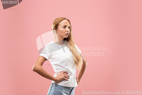 Image of Young serious thoughtful business woman. Doubt concept.