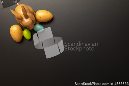 Image of a happy easter decoration with a bunny and some eggs