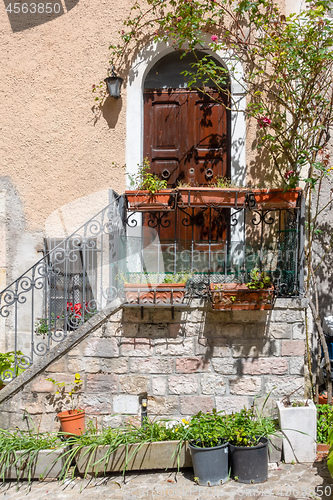 Image of old house door with stairs