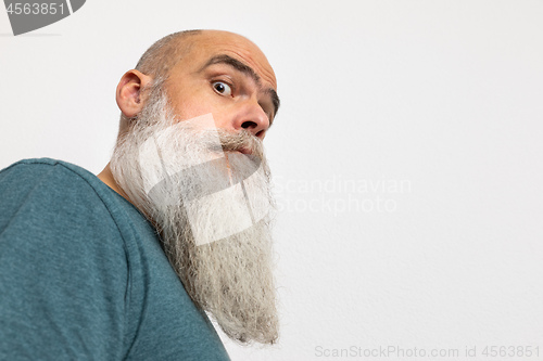 Image of skeptical looking bearded man