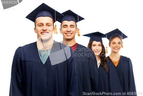 Image of graduates in mortar boards and bachelor gowns