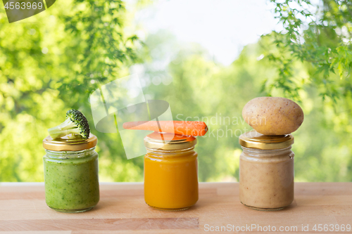 Image of vegetable puree or baby food in glass jars