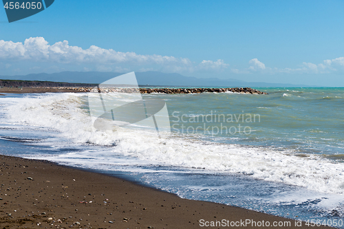 Image of Beautiful sea and the black sandy beach,