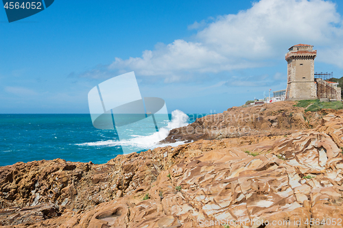 Image of Beautiful azure sea, castle and the rocky beach