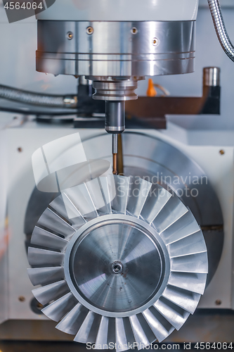 Image of Metalworking CNC lathe milling machine. Cutting metal modern pro