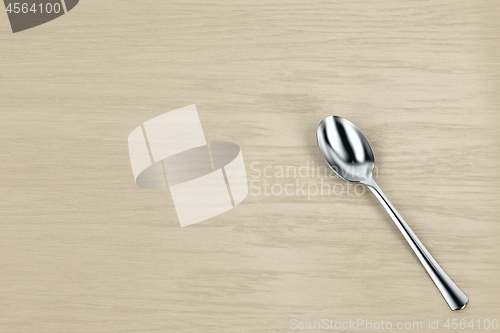 Image of Silver spoon on table