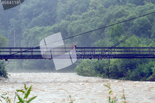 Image of Mother and son on the bridge