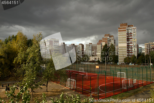 Image of Urban landscape with dark storm sky