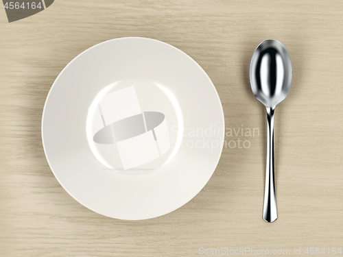 Image of Empty soup bowl and silver spoon