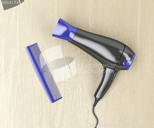 Image of Hair dryer and comb