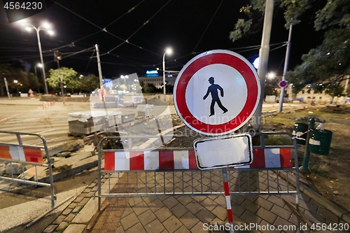 Image of Urban construction site with warning signs