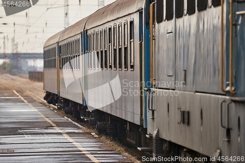 Image of Railway station with old passanger train