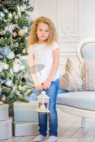 Image of Cute girl and Christmas Tree