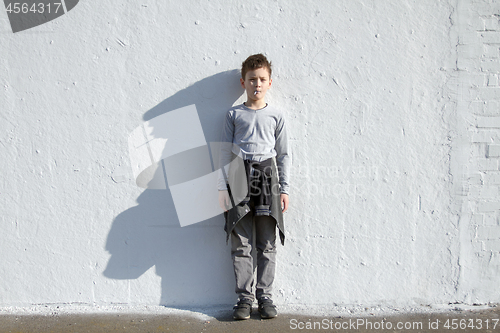 Image of Boy with blue lollipop