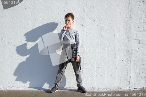 Image of Boy with blue lollipop