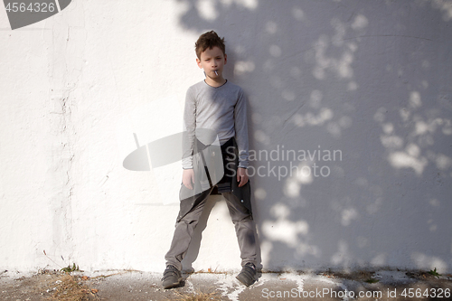 Image of Boy with blue lollipop