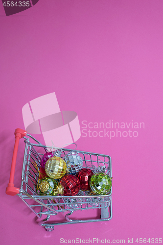 Image of Christmas toys in shopping trolley