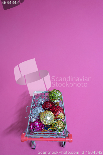 Image of Christmas toys in shopping trolley
