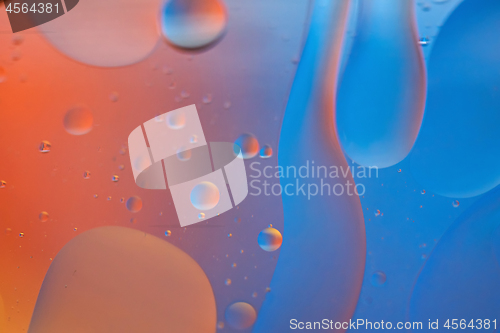 Image of Orange and blue abstract background picture made with oil, water and soap
