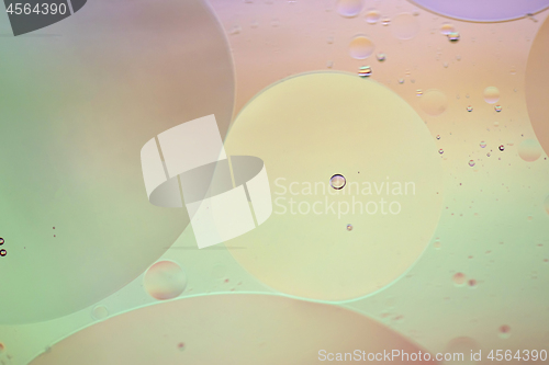 Image of Defocused pastel colored abstract background picture made with oil, water and soap