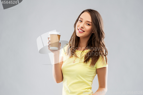 Image of young woman or teenage girl with coffee cup