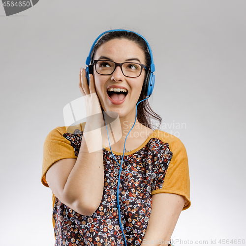 Image of Girl listen music