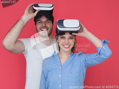 Image of happy couple using VR-headset glasses of virtual reality