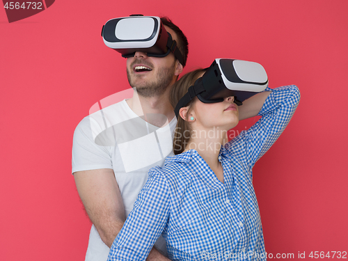 Image of happy couple using VR-headset glasses of virtual reality