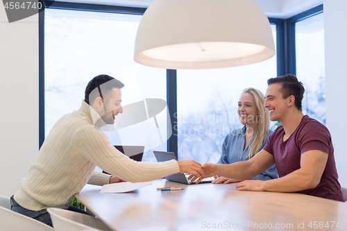 Image of Startup Business Team At A Meeting at modern office building
