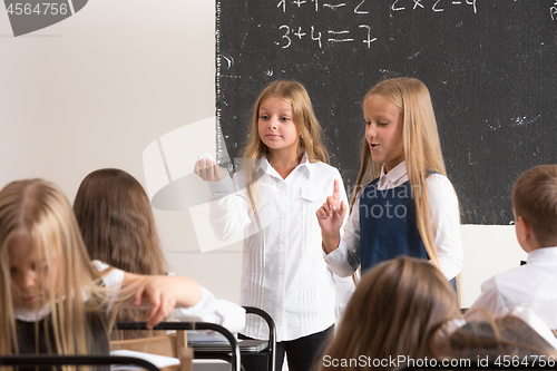 Image of School children in classroom at lesson