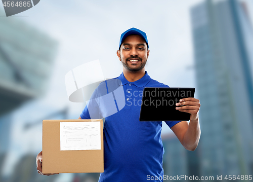 Image of indian delivery man with tablet pc and parcel box