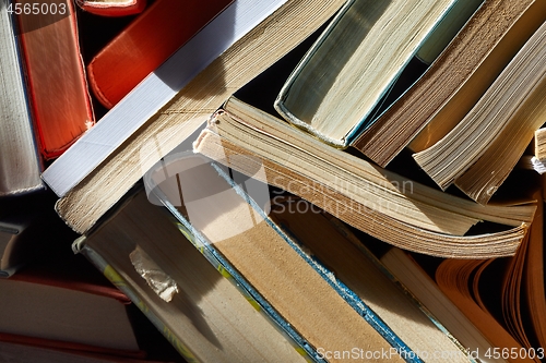 Image of Wall of books piled up