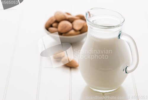 Image of Jar of almond milk with almond nuts