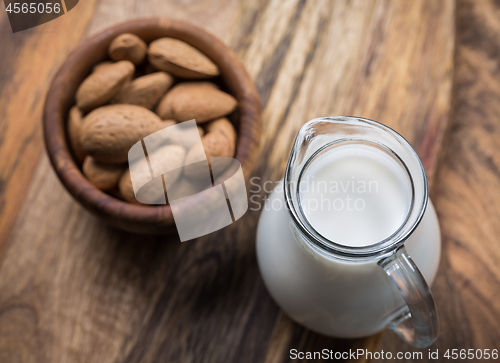 Image of Jar of almond milk with almond nuts