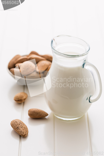 Image of Jar of almond milk with almond nuts