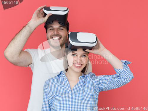 Image of happy couple using VR-headset glasses of virtual reality