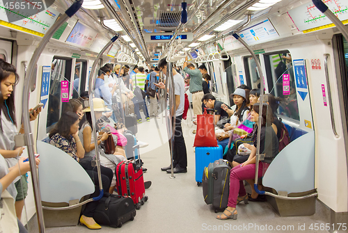 Image of People inside metro train. Singapore