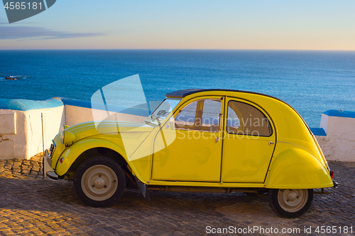 Image of Retro car on the ocean