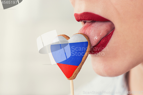 Image of Lips and cookie with flag