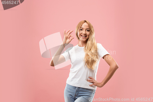 Image of The happy business woman standing and smiling