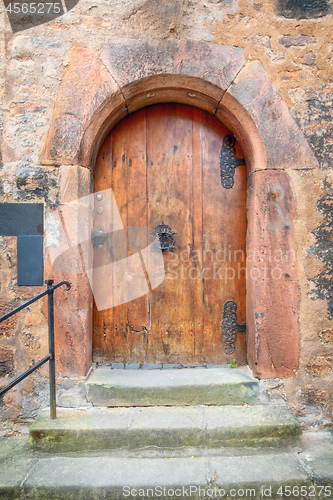 Image of old vintage red wooden door Marburg Germany