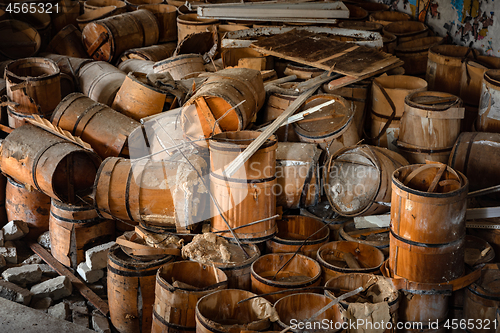 Image of Old and damaged wine and beer barrels