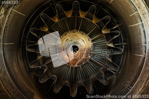 Image of Rusty old jet engine closeup as background