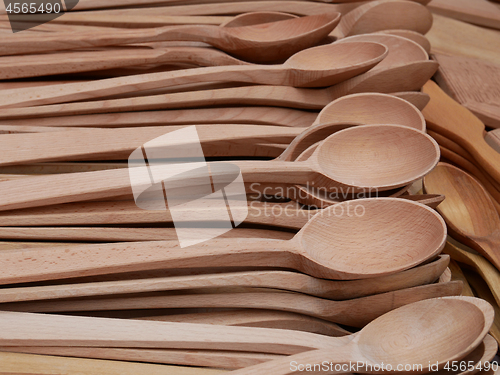 Image of Many Wooden Carved Spoons