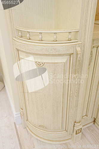 Image of Luxury modern beige kitchen closeup, some drawers open