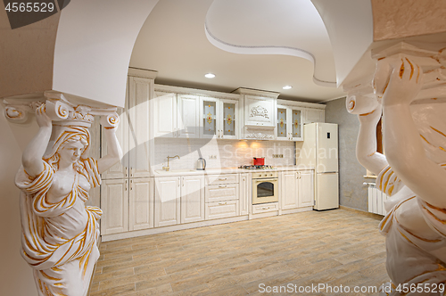 Image of Luxury modern white and beige kitchen interior