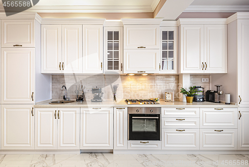 Image of Luxury modern white kitchen interior